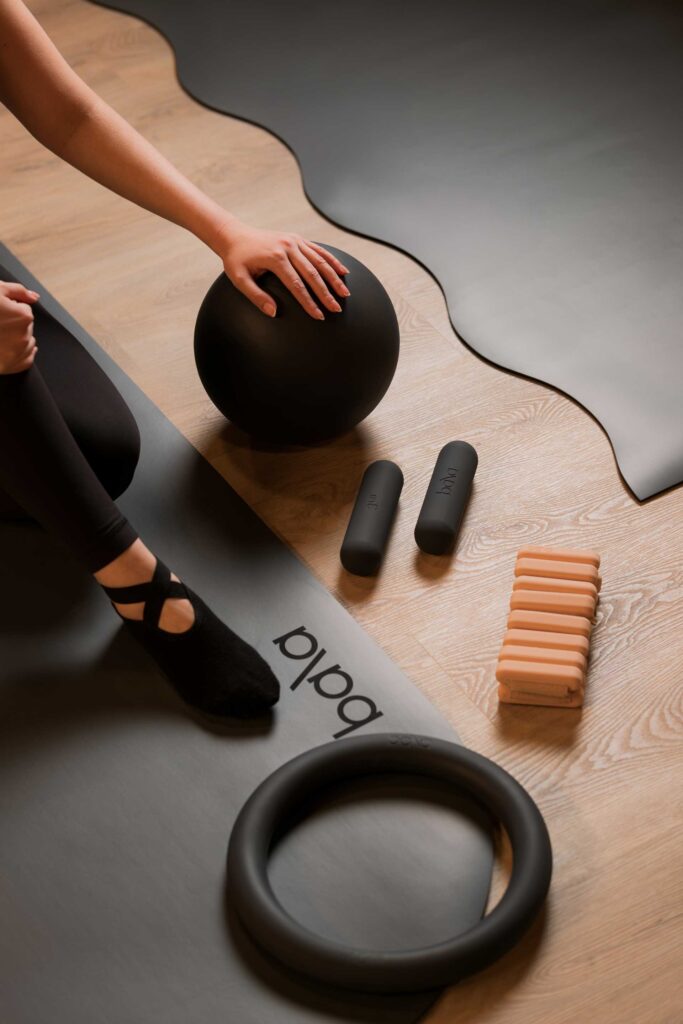 Woman with Pilates props at Pure Motion Dubai