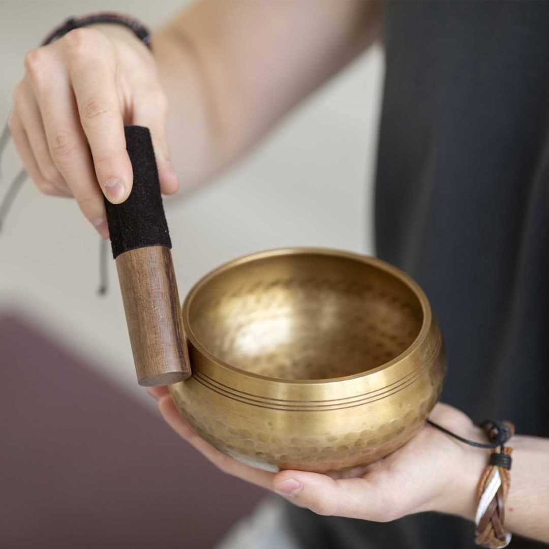 Sound healing bowl during a Pure Motion wellness session