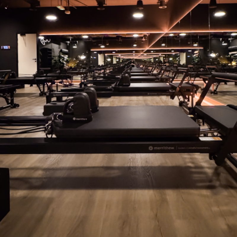 Modern reformer Pilates studio interior at Pure Motion